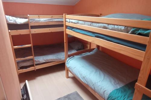 Posteľ alebo postele v izbe v ubytovaní Gite Glaïeul