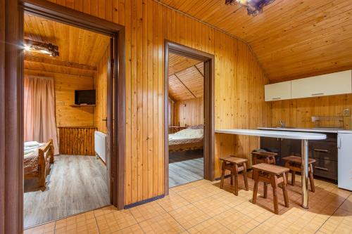 a room with a kitchen and a bedroom at Spark in Bukovel