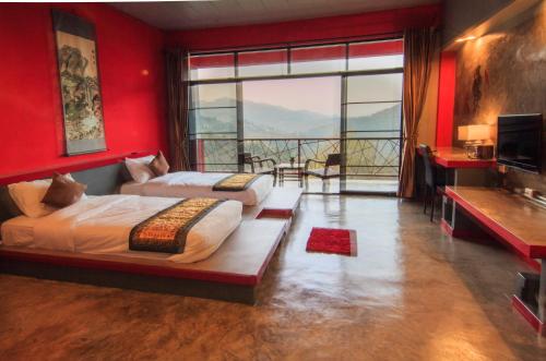 Katil atau katil-katil dalam bilik di Wang Put Tan Boutique House