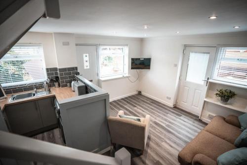 a kitchen with a sink and a counter top at Beach days 1 bed holiday home Prestatyn in Prestatyn