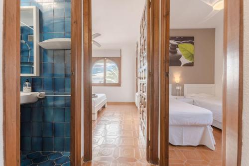 A bed or beds in a room at Casa Ancora by MarCalma