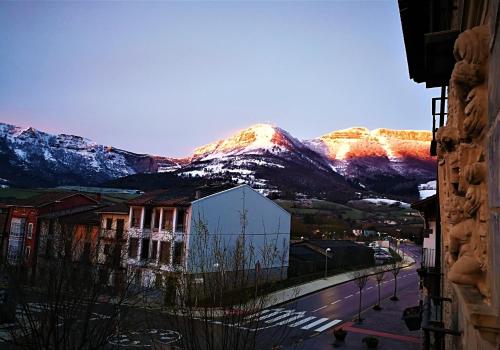a view of a mountain range from a building at VELASCO JAUREGIA-SIERRA DE SUEÑOS in Orduña
