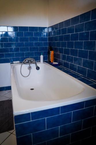 Ένα μπάνιο στο Chambre confortable dans maison bourgeoise