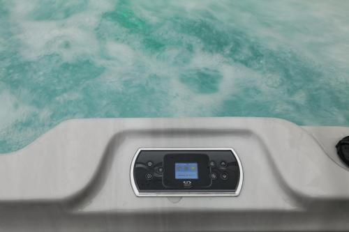 a remote control on the back of a boat in the water at PRESTIGE BOUTIQUE APARTHOTEL -Piazza Duomo in Milan