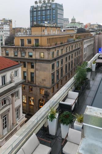 a view from the roof of a building with plants at PRESTIGE BOUTIQUE APARTHOTEL -Piazza Duomo in Milan