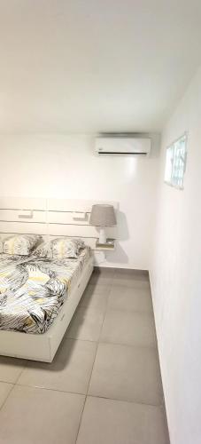 Cama o camas de una habitación en DV Real Philoxénia