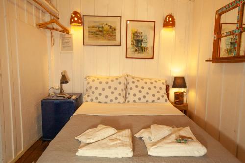 Ein Bett oder Betten in einem Zimmer der Unterkunft Pousada das Meninas