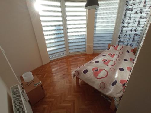Postel nebo postele na pokoji v ubytování Apartman STANKOVIĆ