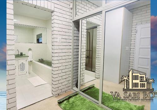 a rendering of a bathroom in a house at Va sabi bo, Best View, Luxury Family Villa in Hartbeespoort Dam in Hartbeespoort