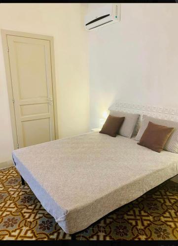 Postel nebo postele na pokoji v ubytování Angelo Apartments & Rooms