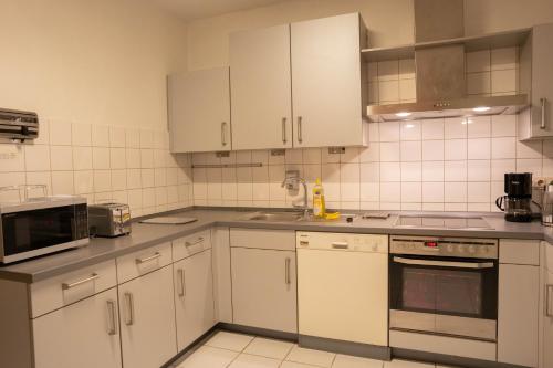 Dapur atau dapur kecil di Haus Kim Thinh