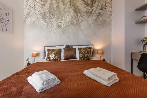 Katil atau katil-katil dalam bilik di Emihouse Skyline Apartments