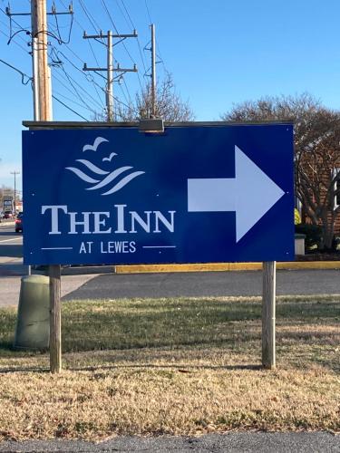 a blue sign for thein at lees at The Inn at Lewes in Rehoboth Beach