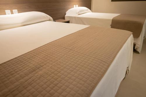 Katil atau katil-katil dalam bilik di Bravo's Hotel