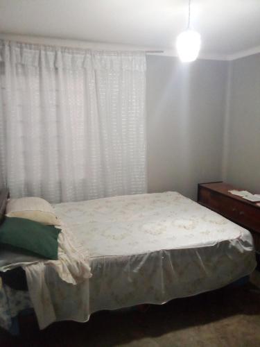 Un pat sau paturi într-o cameră la No. 271