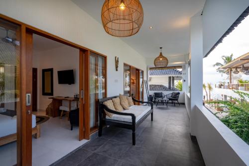 TV a/nebo společenská místnost v ubytování Ohana's Beachfront Resort & Beach Club