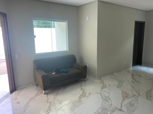 Ein Sitzbereich in der Unterkunft Bela Casa com 3 quartos mobiliada na Zona Leste