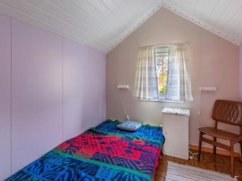 Giường trong phòng chung tại Holiday home Rossfjordstraumen