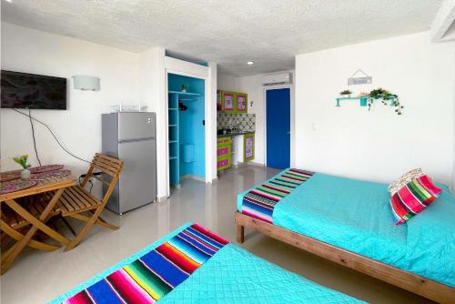 Postel nebo postele na pokoji v ubytování Renovated Studio in Cancun Beach at the Hotel Zone