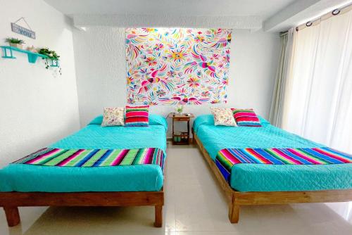 Postel nebo postele na pokoji v ubytování Renovated Studio in Cancun Beach at the Hotel Zone