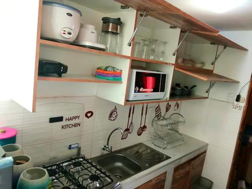 Una cocina o zona de cocina en PRIVATE APARTMENT IN THE HISTORICAL CENTER OF CUSCO
