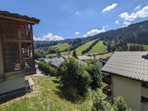 Appartement 48m² face aux pistes avec balcon, 4 couchages, près du centre des Gets, garage inclus