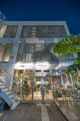 a building with an entrance to a store at UNPLAN Kagurazaka in Tokyo