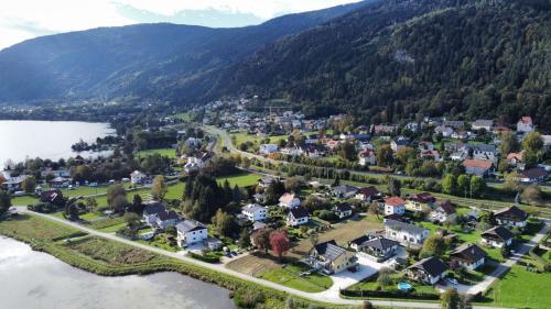 an aerial view of a small town next to a lake at Ferienhaus Silja in Steindorf am Ossiacher See