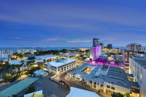 an overhead view of a city at night at ZEN SEA BREEZE - Darwin's Premier Family Apt in Darwin