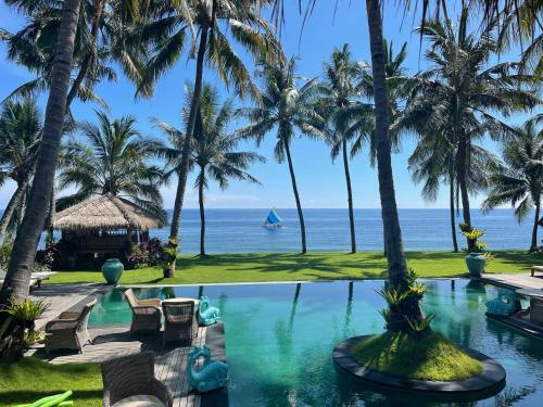 a view of the ocean from the resort at Louka Beach Bali in Tianyar