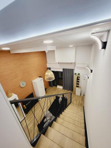 a view of a room from the top of a staircase at Carbonell 1 in Valencia