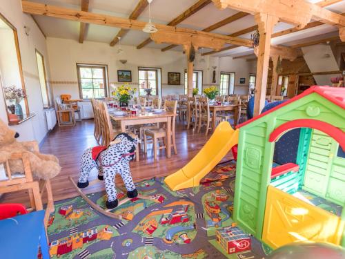 a room filled with lots of childrens play equipment at Gościniec Rabe - Agro&SPA in Ustrzyki Dolne
