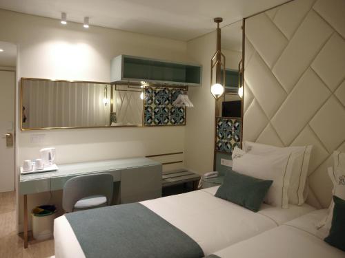 New Style Lisbon Hotelにあるベッド