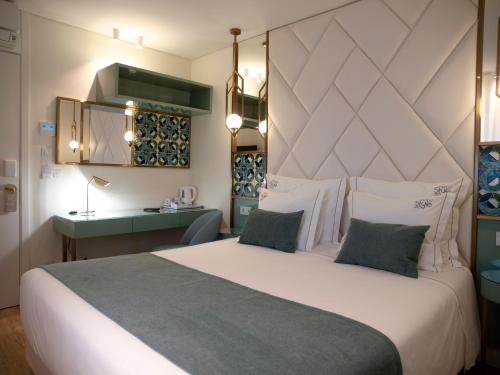New Style Lisbon Hotelにあるベッド