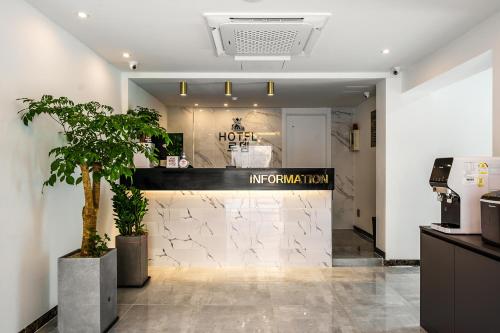 a lobby of a hotel with a hotel entrance at Hotel Rodem in Incheon