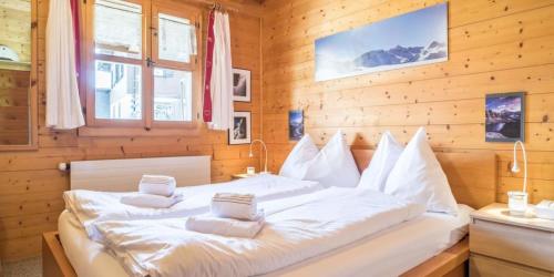 Cama o camas de una habitación en Burehüsli Axalp