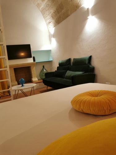 Khu vực ghế ngồi tại Vecchia Mottola Albergo Diffuso