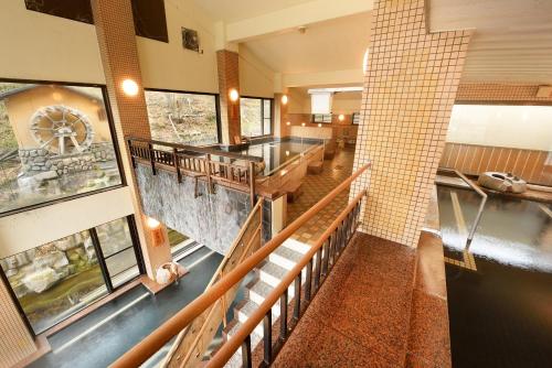 an overhead view of a room with a staircase and a building at Sansuiso Tsuchiyu Spa in Fukushima