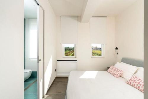 Ένα ή περισσότερα κρεβάτια σε δωμάτιο στο Martina's Vineyard - rooms
