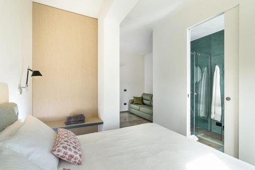 Ένα ή περισσότερα κρεβάτια σε δωμάτιο στο Martina's Vineyard - rooms