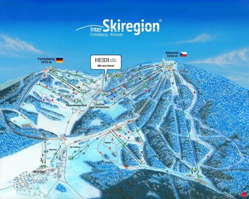 a map of a ski resort in the snow at Boutique apartment Heidi with mountain view in Loučná pod Klínovcem