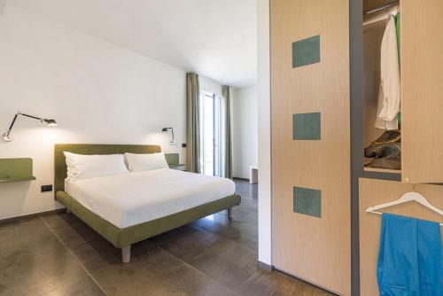 Ένα ή περισσότερα κρεβάτια σε δωμάτιο στο Martina's Vineyard - rooms