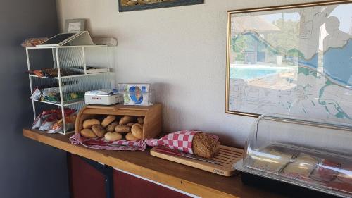 a counter top with a bunch of food on it at Tisza White House in Tiszaszőlős