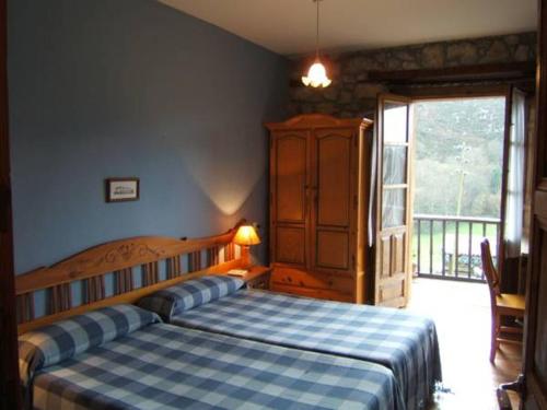 Postel nebo postele na pokoji v ubytování Finca el Palacio
