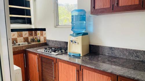 a kitchen with a coffee maker on a counter at Ama Residence in Matale
