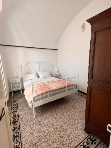 A bed or beds in a room at Sea View, in the old town Santo Stefano Al Mare