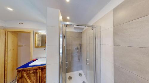 a bathroom with a shower and a sink at hiša Margit, Rateče 150 in Rateče