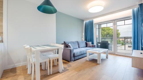 Posedenie v ubytovaní Apartamenty Sun & Snow Port Krynica przy porcie i promenadzie