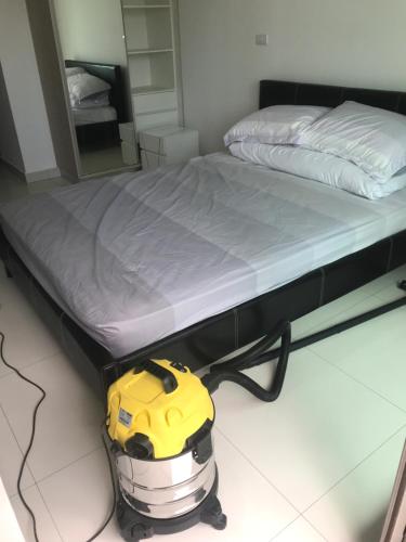 En eller flere senge i et værelse på 泰国芭提雅中天海滩拉古那1期度假房C808