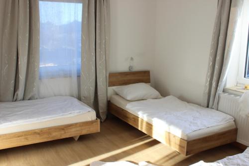 Postel nebo postele na pokoji v ubytování Home W4 - Apartment Engel